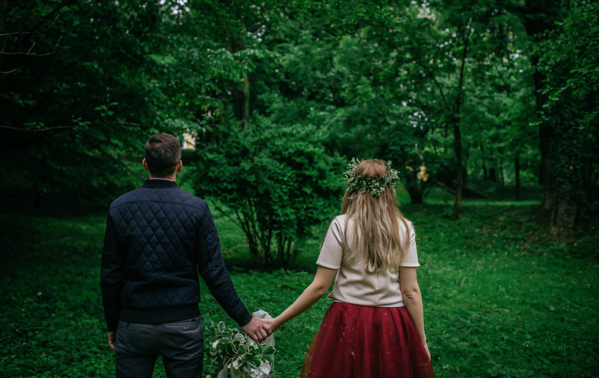 couple-walking-in-woods