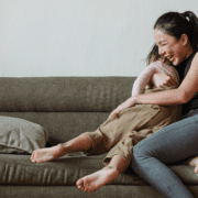 woman hugging her daughter